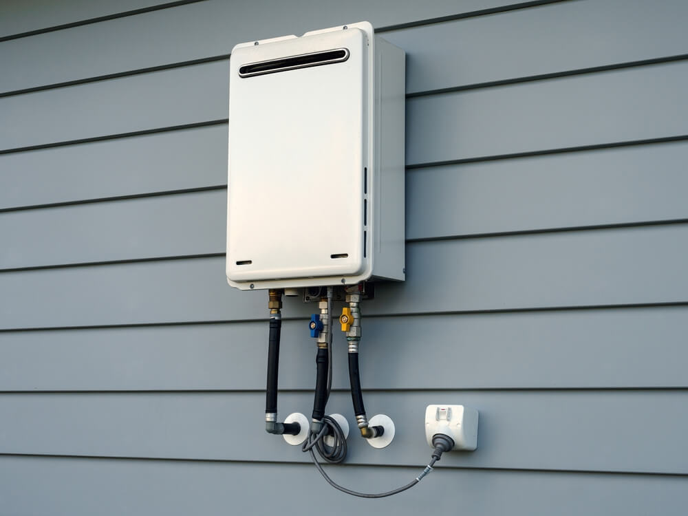 A modern tankless water heater installed in a home, providing energy-efficient hot water on demand.
